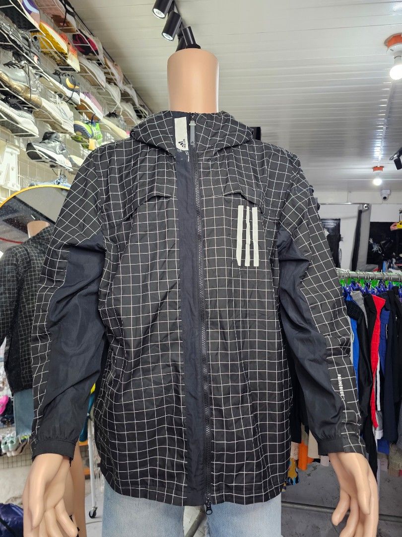 Adidas W.N.D. Windproof Hooded Jacket (Category: Coats, Jackets and Outerwear) located in Baguio. Submitted by kayeonlineshop (Listing ID 1468299971, Image 2). Description: -Adidas W.N.D. Windproof Hooded Jacket (often produced in a black-and-white grid pattern) -measurements included in the photos.
