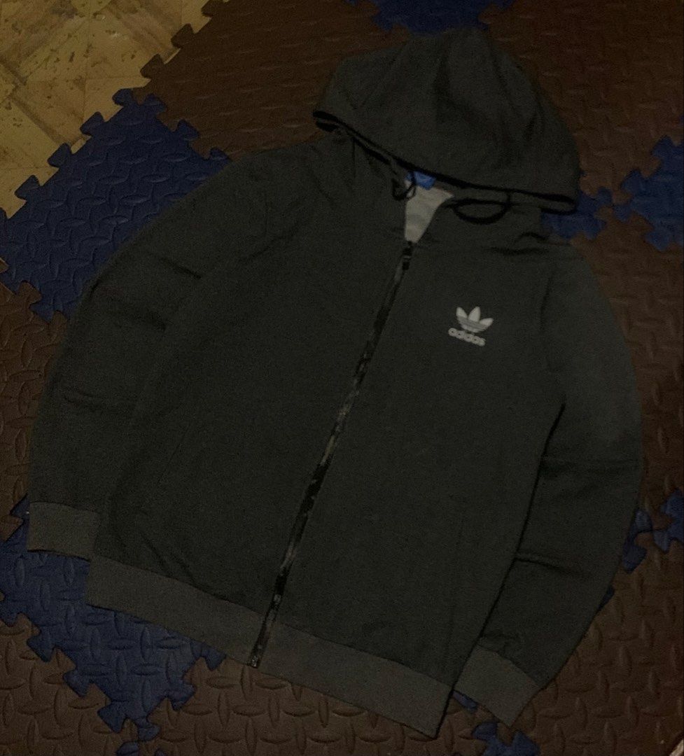 ADIDAS ZIP HOODIE SIDE LOGO TREEFOIL (Category: Coats, Jackets and Outerwear) located in Quezon. Submitted by lowslow_ (Listing ID 1468307795, Image 1). Description: NO ISSUE AS NEW CONDITION.