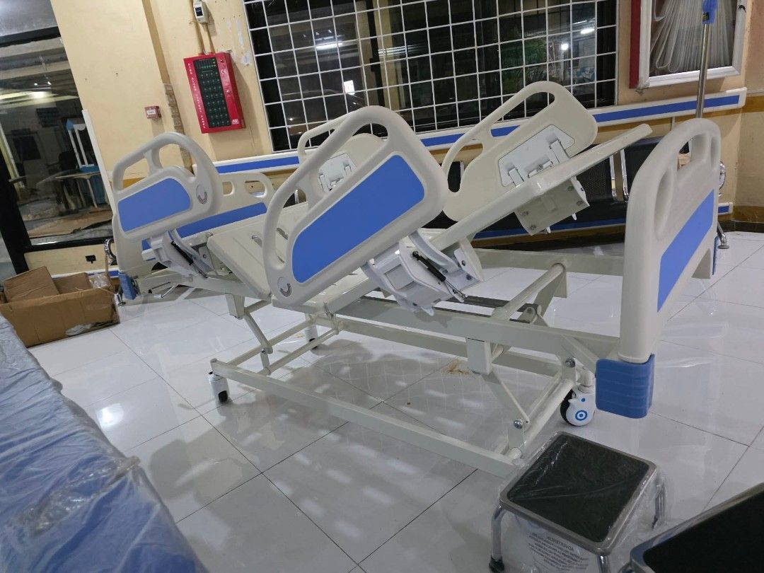 Adjustable Medical Examination Table with Storage Cabinet (Category: Medical Supplies & Tools) located in Manila. Submitted by brightflower_273879 (Listing ID 1468338968, Image 1). Description: - Color & Design: Sturdy white base cabinet with an adjustable black headrest - Storage: Multiple drawers and lower cabinet doors for organized medical or salon supplies - Mobility: Equipped with smooth-rolling wheels for easy repositioning - Includes: A c