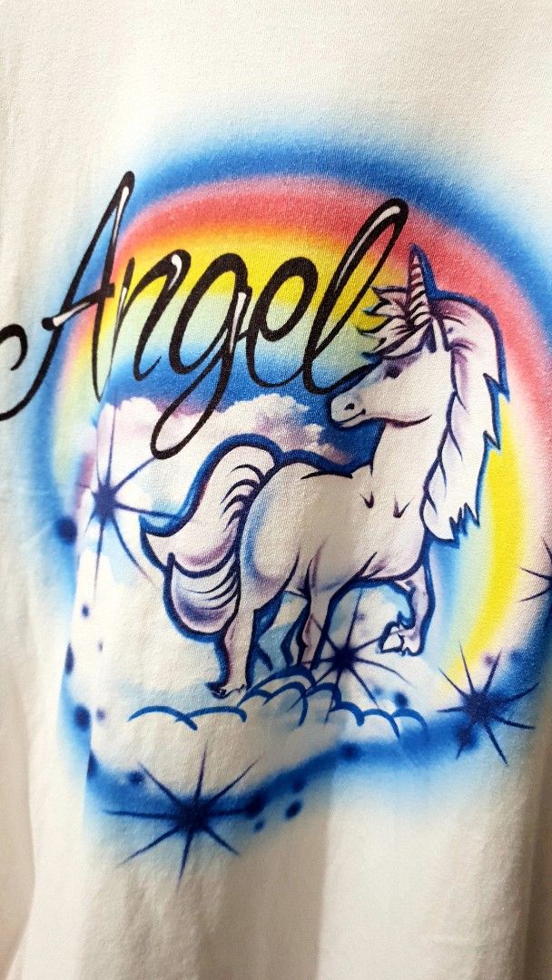 Airbrush Unicorn Rainbow Angel (Category: Tshirts & Polo Shirts ) located in Taguig. Submitted by wethrifting2021 (Listing ID 1468418394, Image 2). Description: Item: Airbrushed Unicorn🔥 Size: Cut tag Width: 23.5 Length: 30 Condition: Excellent Issue: Minimal Deo stain SWIPE MORE DETAILS. DM to purchase 📩.