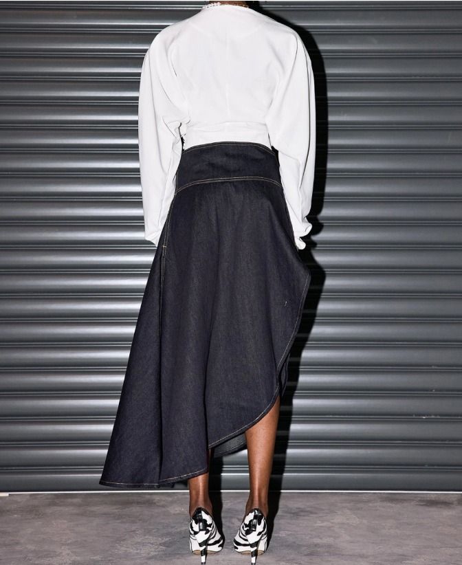 ALAIA PARIS ASYMMETRICAL WOOL TWILL MIDI FLUID SKIRT (Category: Skirts) located in Manila. Submitted by grailledrags (Listing ID 1468303660, Image 2). Description: ALAIA PARIS ASYMMETRICAL WOOL TWILL MIDI FLUID SKIRT L36•W30-32 •BRAND NEW CONDITION •COMPLETE TAGS •MADE IN ITALY •lUX WEAR •ASSYMETRICAL DESIGN •PM FOR EXTRA DETAILS 19,000+ sf.