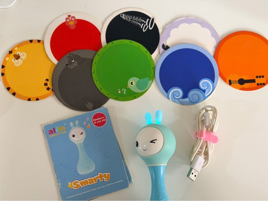 Alilo Smarty Shake & Tell Rattle - Blue (Category: Infant Playtime) located in Paranaque City. Submitted by sweetiesarah01 (Listing ID 1468352944, Image 2). Description: Alilo Smarty Shake and Tell Rattle - Blue ✅ Rattle and Were ❌ No Box ❗️chewed cardboard and missing one.