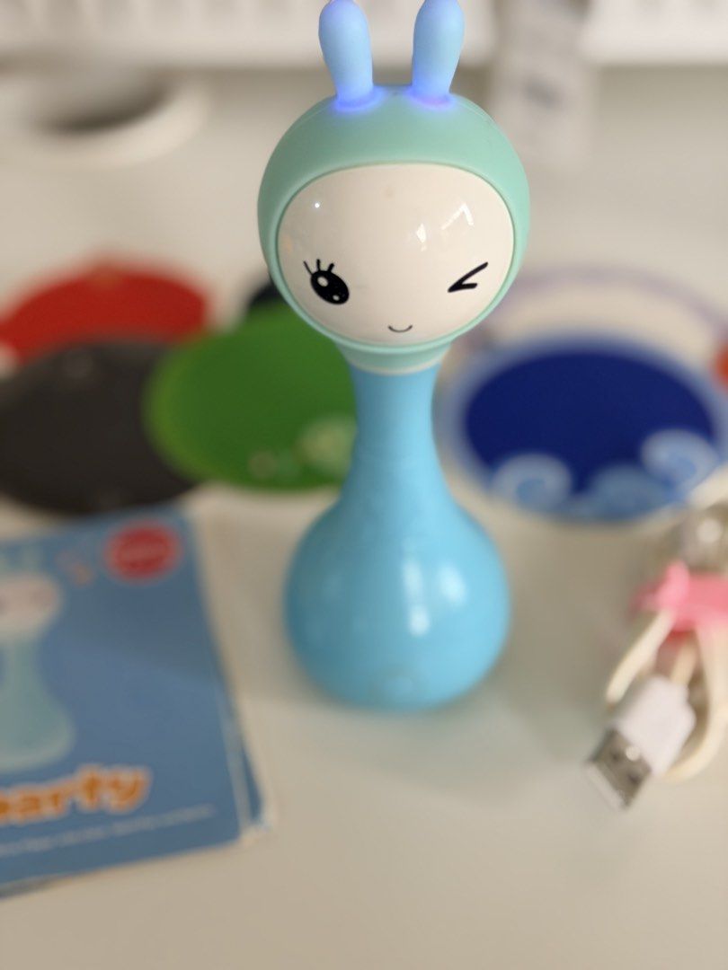 Alilo Smarty Shake & Tell Rattle - Blue (Category: Infant Playtime) located in Paranaque City. Submitted by sweetiesarah01 (Listing ID 1468352944, Image 1). Description: Alilo Smarty Shake and Tell Rattle - Blue ✅ Rattle and Were ❌ No Box ❗️chewed cardboard and missing one.