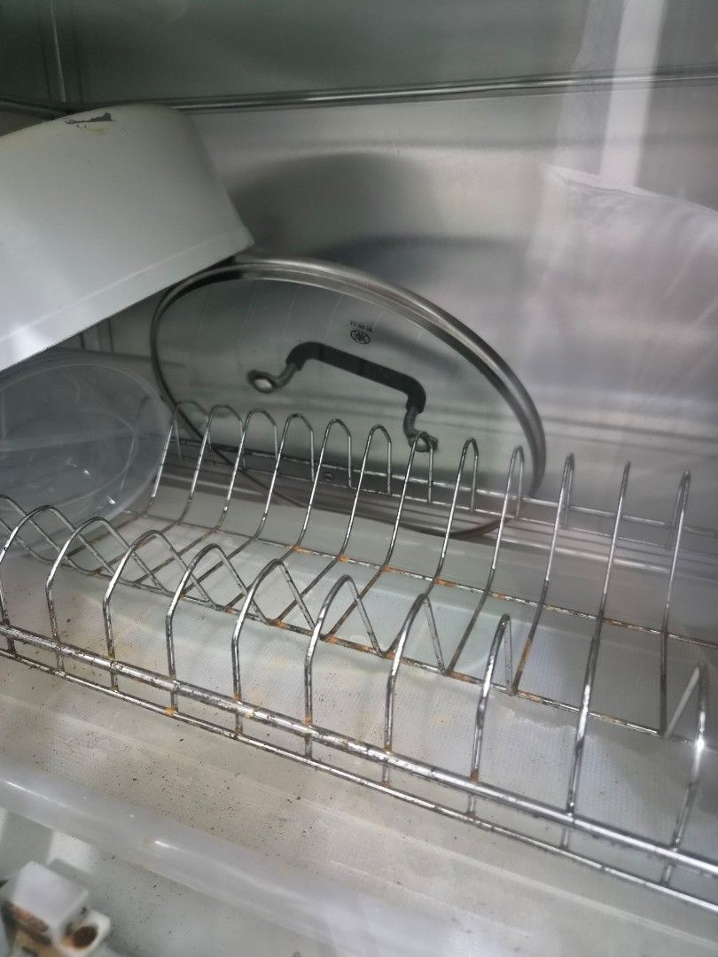 Aluminum double deck kitchen dish drying rack cabinet (Category: Food Organization & Storage) located in Taguig. Submitted by nowinowy (Listing ID 1468491089, Image 3). Description: - Aluminum and glass kitchen cabinet for drying and storing dishes - Two tiers inside with built-in wire racks for plates, bowls, and pot lids - Glass doors to keep your dinnerware dust-free - Sturdy metal frame construction Note: Overall, item is well maintained and 