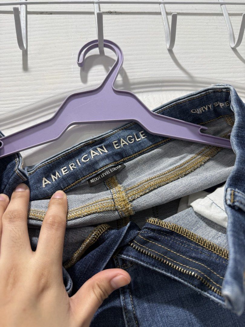 American Eagle Curvy Super Stretch Jeans Size 2 Short (Category: Jeans) located in Manila. Submitted by prelov3dbysteph (Listing ID 1468429328, Image 2). Description: - Brand: American Eagle - Style: Curvy Fit (Next Level Stretch) - Size: 2 Short - Color/Wash: Dark wash - Closure: Brass button and zipper fly - Condition: Worn a few times, still in great shape.