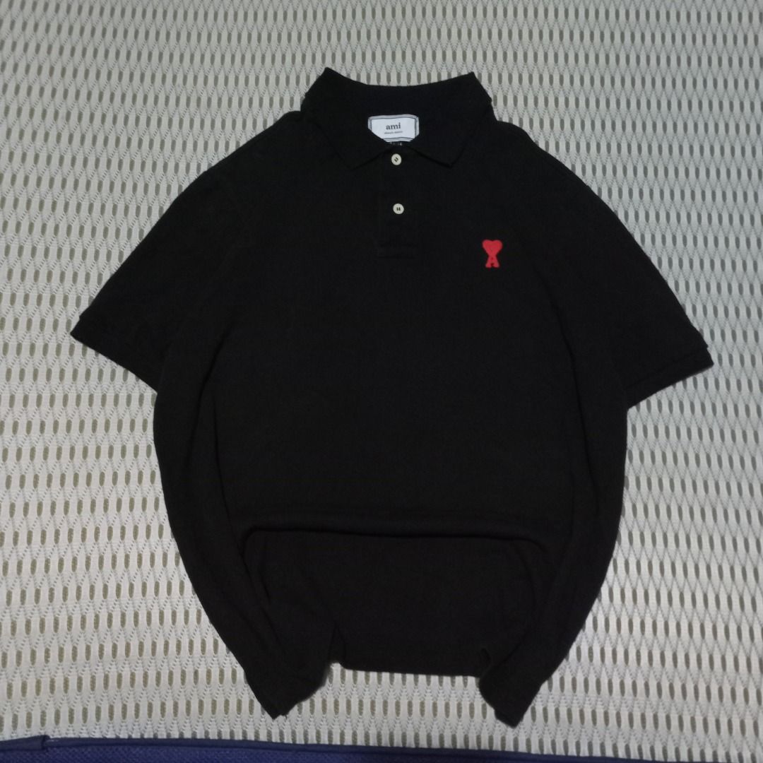 Ami Paris Black Polo Shirt (Category: Tshirts & Polo Shirts ) located in General Santos City (Dadiangas). Submitted by collection_9500 (Listing ID 1468499641, Image 1). Description: Ami Paris Black Polo Shirt 22.5 x 26 Large Excellent, minimal lints collar Gensan loc Pm for inquiries All are thrifted items.