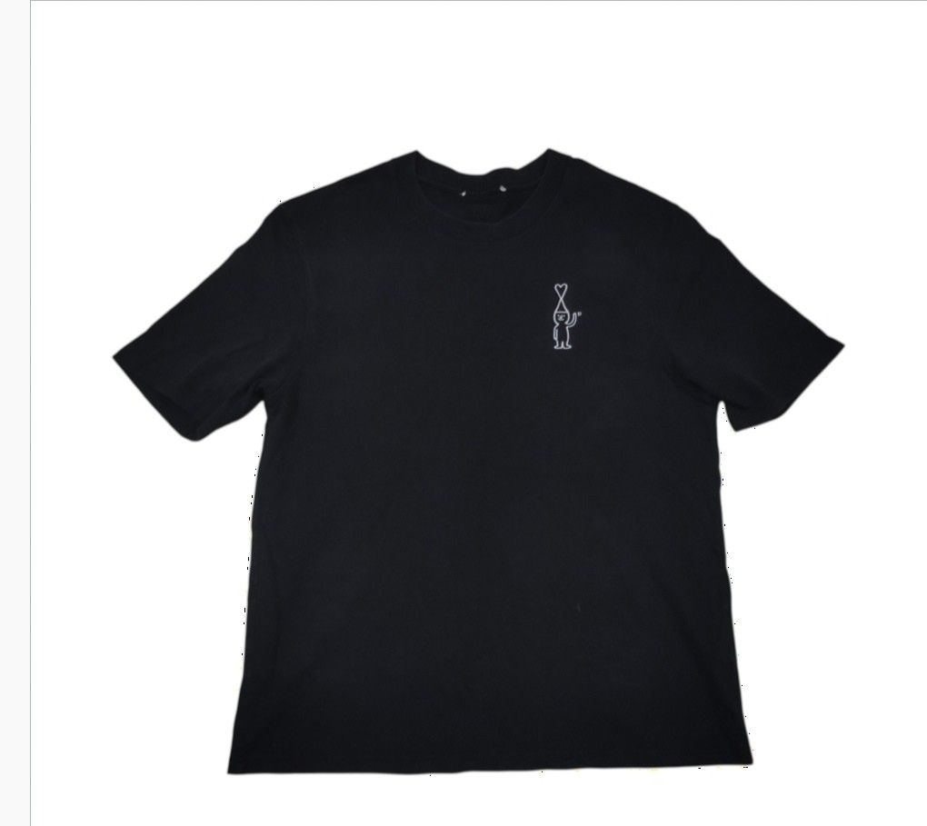 AMI Shirt (Category: Shirts) located in Cagayan de Oro. Submitted by lootfindzzzz (Listing ID 1468356060, Image 1). Description: - Color: Black - Fit: Short sleeves, crew neck - Design: Small white line art character with a heart antenna on the left chest - Style: Clean, minimalist everyday casual wear - Versatility: Super easy to match with your favorite jeans or shorts.