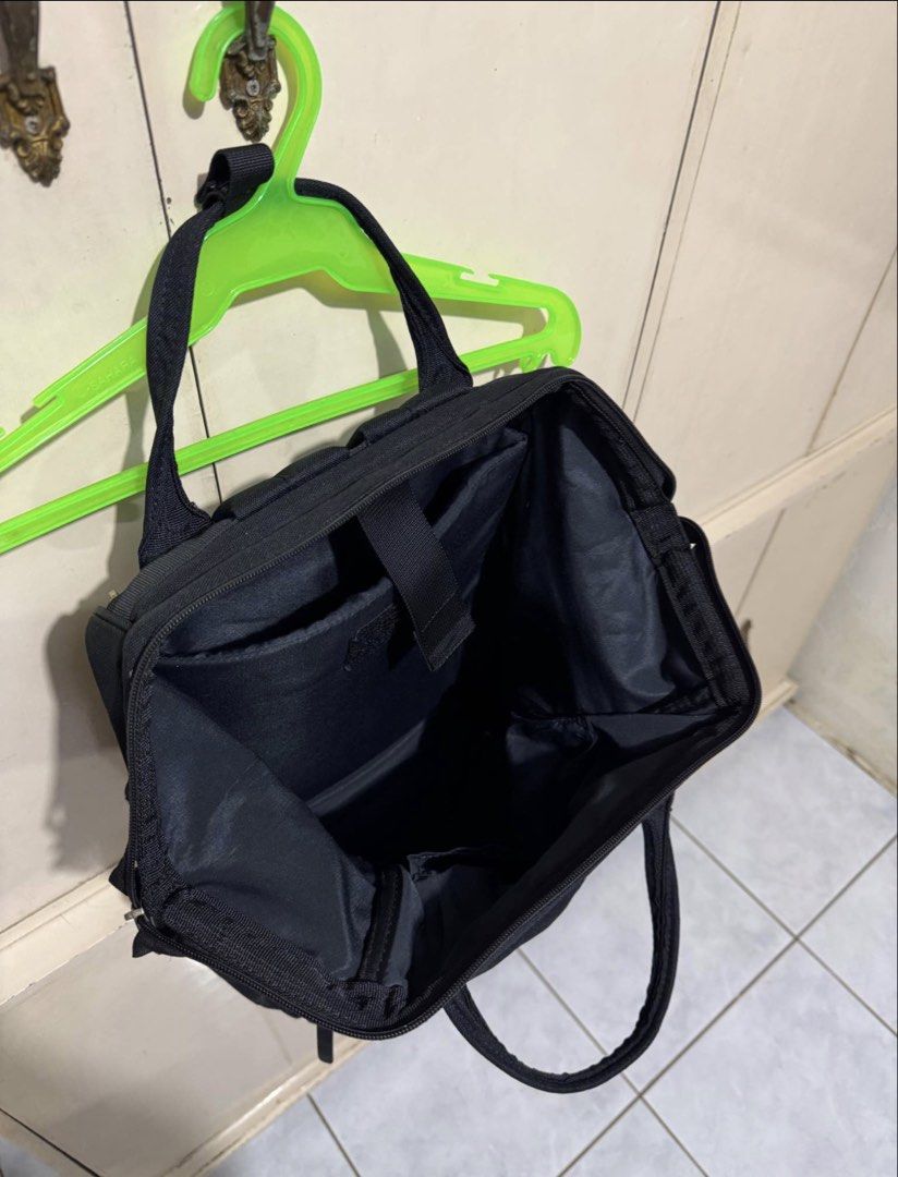 Anello Black Backpack Repreve Eco-Friendly Material (Category: Backpacks) located in Manila. Submitted by me.declut (Listing ID 1468460167, Image 1). Description: - Brand: Anello - Material: Eco-friendly Repreve recycled canvas - Color: Classic Black - Compartments: Secure main zipped compartment and front zipped pocket - Interior: Built-in laptop sleeve with velcro strap plus extra slip pockets - Carry Options: Dual top carry handles and adjusta
