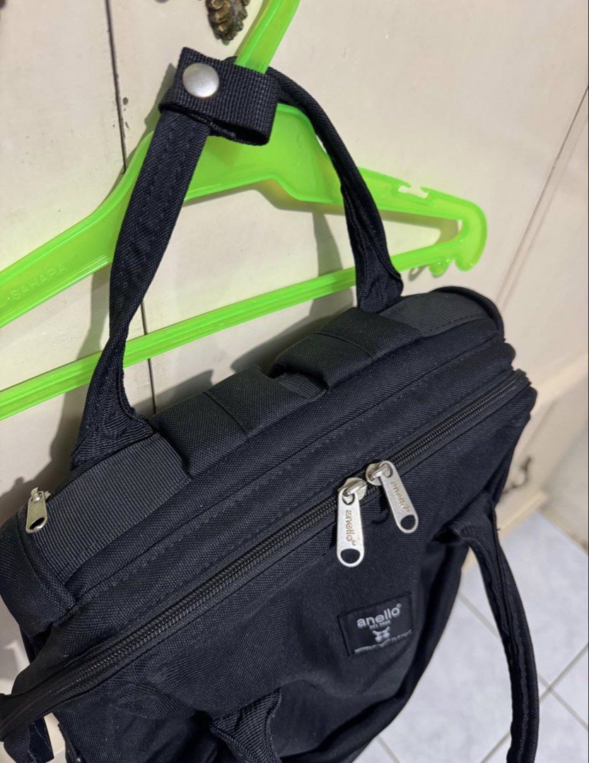 Anello Black Backpack Repreve Eco-Friendly Material (Category: Backpacks) located in Manila. Submitted by me.declut (Listing ID 1468460167, Image 2). Description: - Brand: Anello - Material: Eco-friendly Repreve recycled canvas - Color: Classic Black - Compartments: Secure main zipped compartment and front zipped pocket - Interior: Built-in laptop sleeve with velcro strap plus extra slip pockets - Carry Options: Dual top carry handles and adjusta