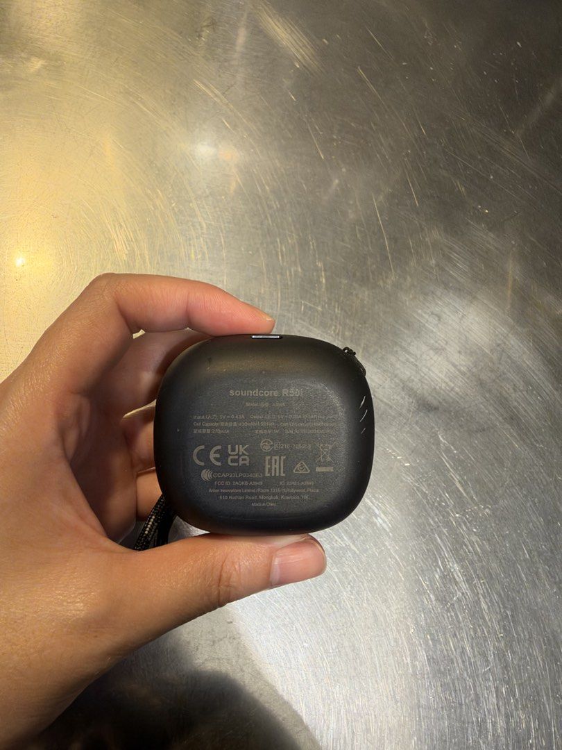Anker Soundcore R50i True Wireless Earbuds Black (Category: Earphones) located in Manila. Submitted by garagesalebykoda (Listing ID 1468432136, Image 3). Description: Only worn once on ears to test if it worked. Never used after that, cleaned it as well. - Model: Anker Soundcore R50i True Wireless Earbuds - Color: Classic Black - Inclusions: Both earbuds, charging case, and attached lanyard strap - Key Features: Compact pocket-sized design, clear