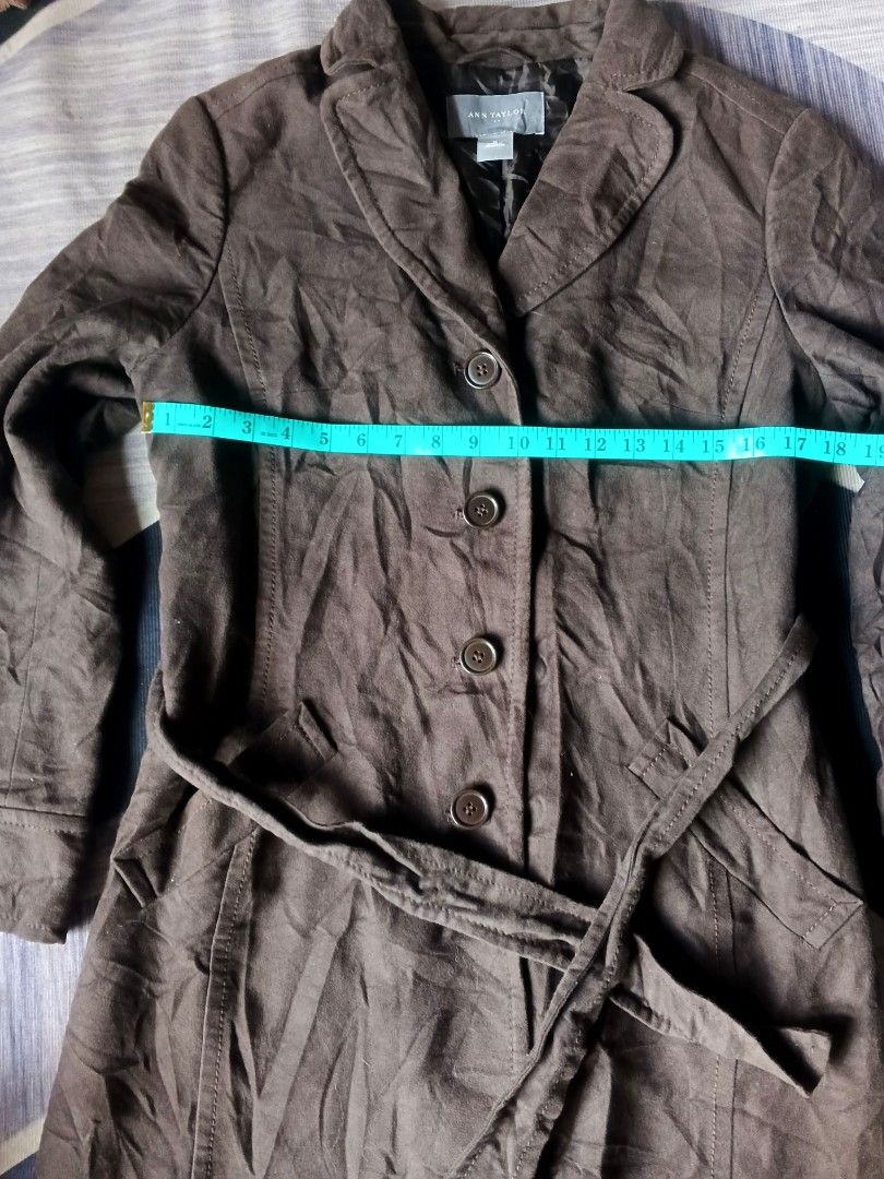 ANN TAYLOR COAT (Category: Coats, Jackets and Outerwear) located in Manila. Submitted by icamalicdem29 (Listing ID 1468286337, Image 2). Description: brown mid-length trench coat from Ann Taylor, highlighting a casual single-breasted button design, wide notched lapels, and a matching fabric tie belt at the waist..