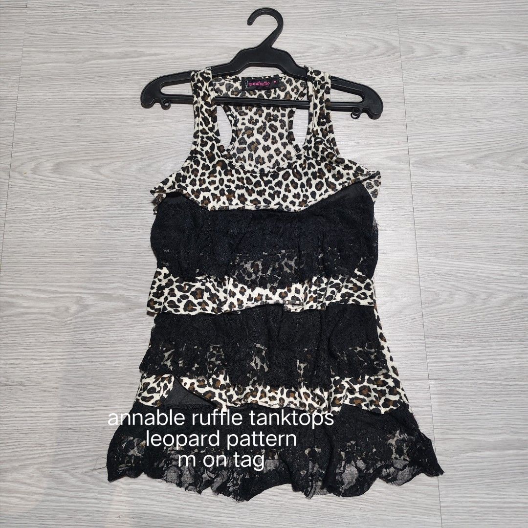 annable ruffled tops (Category: Activewear) located in Amadeo. Submitted by josephotep (Listing ID 1468489303, Image 1). Description: annable ruffle tanktops leopard pattern m on tag as new no issue 350 plus sf loc cavite pm📥.