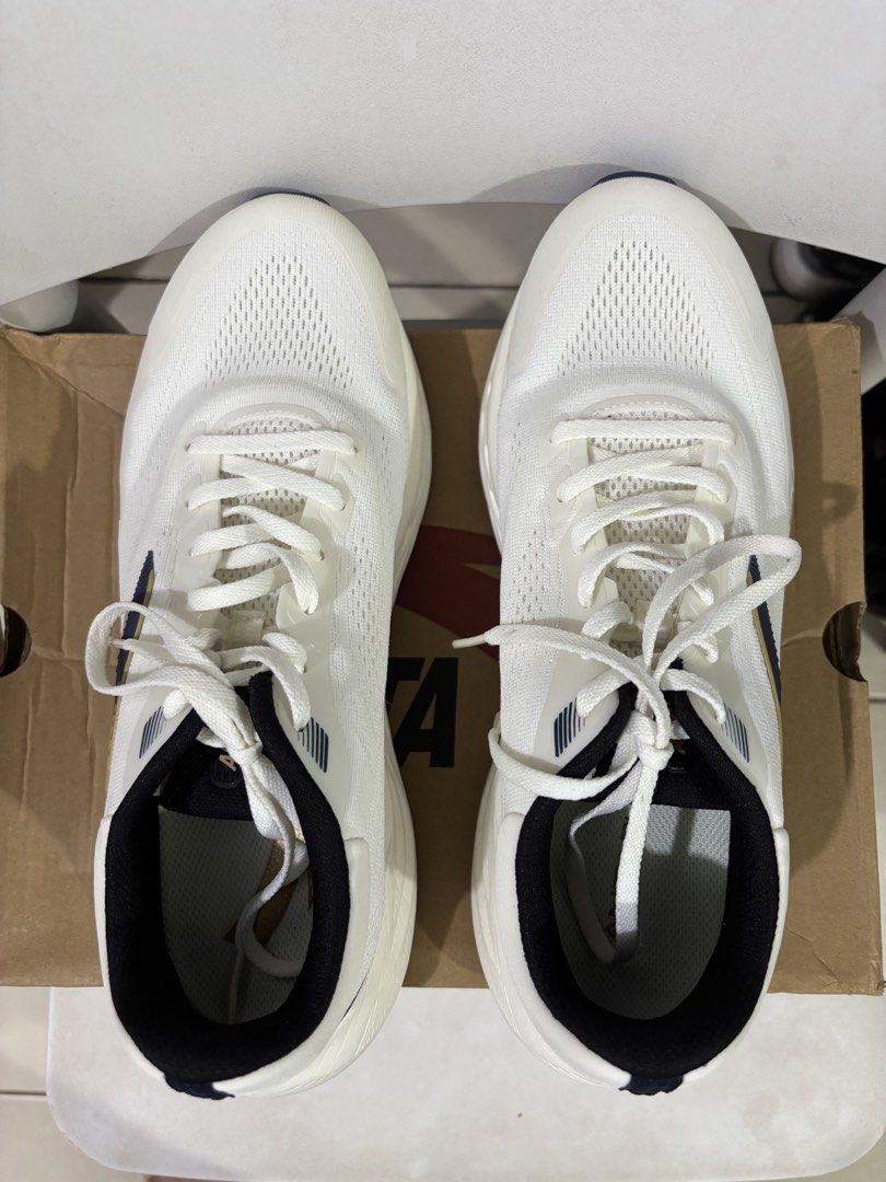 Anta Running Shoes White Navy Size US 8 (Category: Sneakers) located in Manila. Submitted by jonard2297 (Listing ID 1468447978, Image 3). Description: - Brand: ANTA - Color: White and Navy - Size: US 8 / UK 7 / EUR 41 / CHN 255 - Condition: Hardly worn, clean outsoles - Features: Breathable mesh upper, thick cushioning sole, black collar lining - Inclusion: Original ANTA box included - Used once.