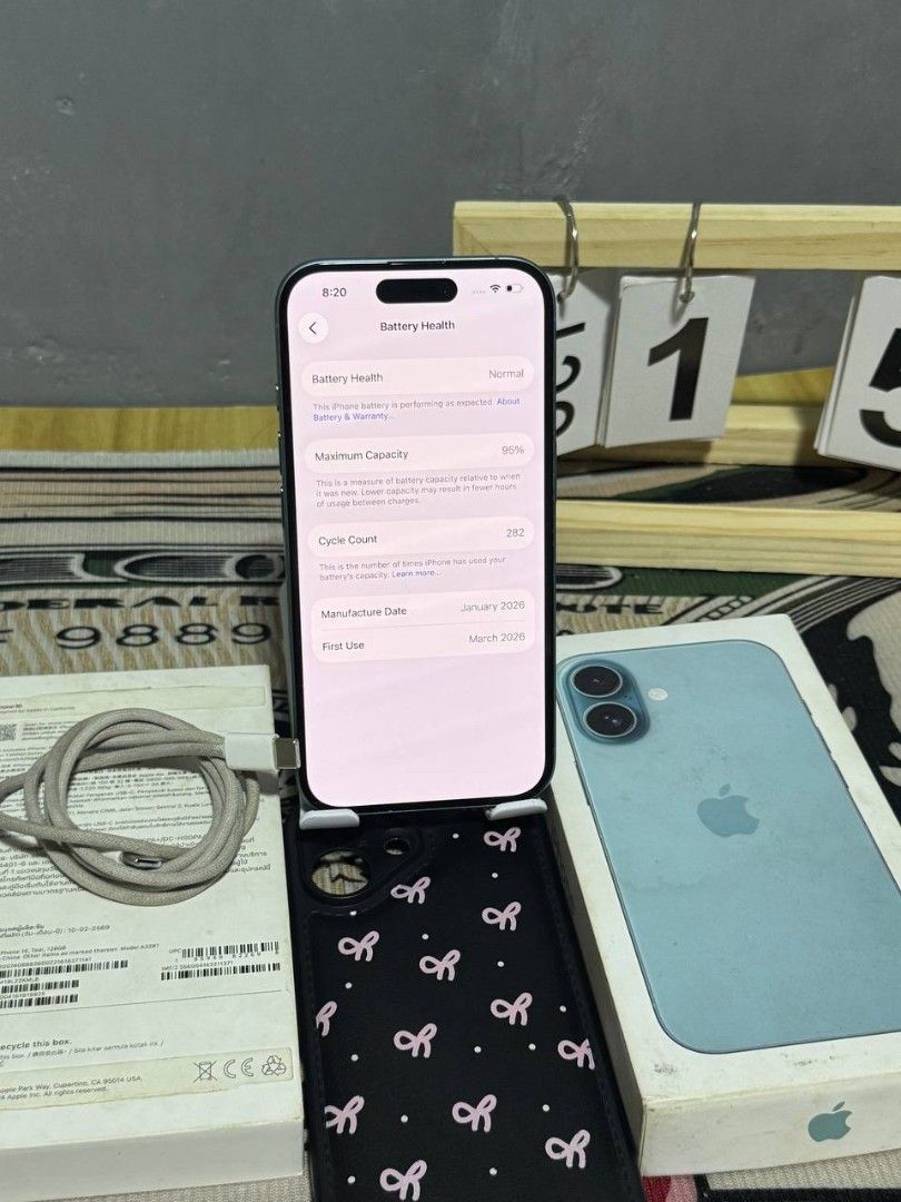 Apple iPhone 16 Teal 128GB with Box and Case (Category: iPhone 16 Series) located in Manila. Submitted by warmhorse.7002aa (Listing ID 1468325432, Image 3). Description: - Model: Apple iPhone 16 - Color: Teal - Storage: 128GB - Battery Health: 95% - Warranty: AppleCare limited warranty active until March 2027 - Inclusions: Original box, charging cable, and free black phone case with pink bow patterns - Condition: Excellent, well-taken care of.
