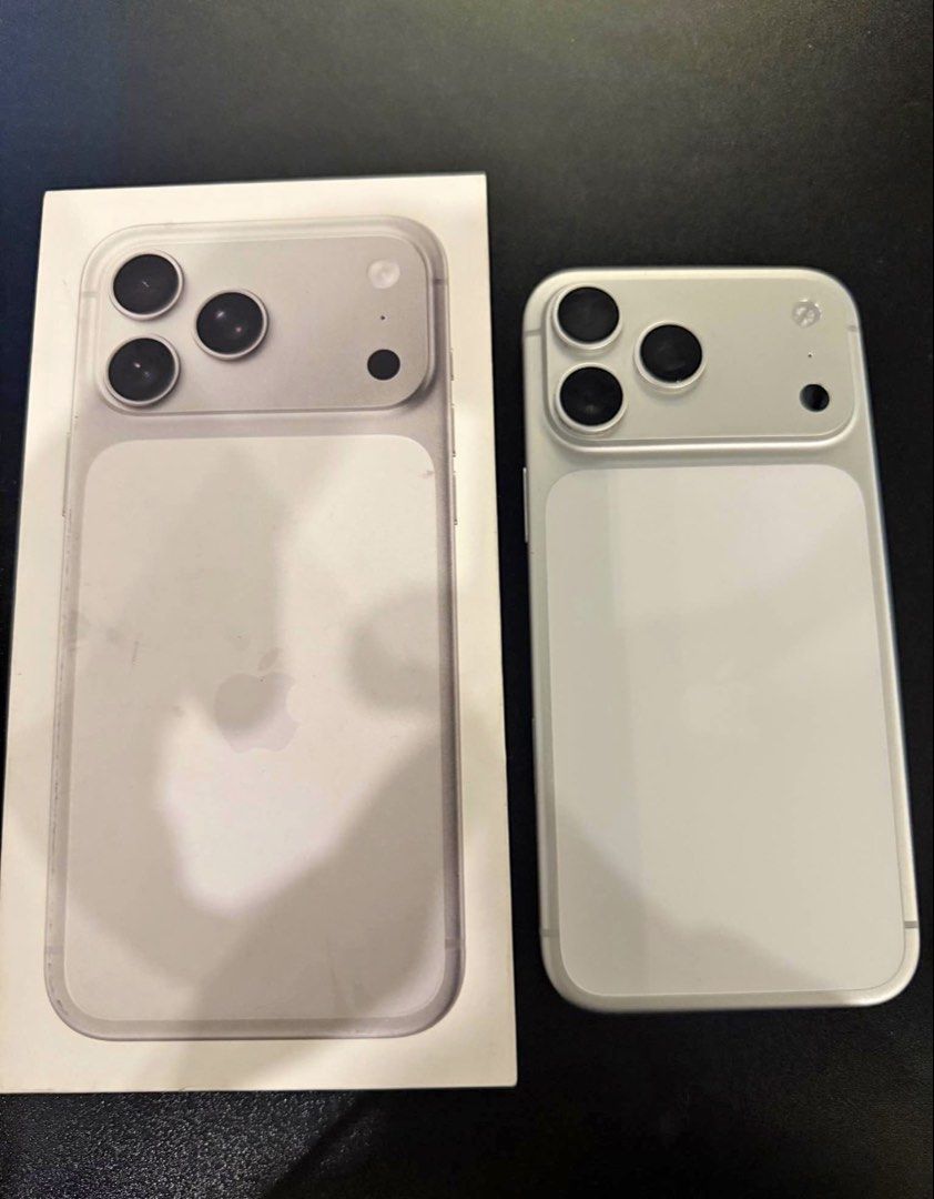 Apple iPhone 17 Pro Max 256GB Silver (Category: iPhone 17 Series) located in Iloilo. Submitted by heco2k1999542 (Listing ID 1468395123, Image 2). Description: IPhone 17 Pro Max in silver with 256GB storage capacity. Includes original retail box. Model number MFYM4X/A, serial number JPDCXPV7HK. Limited warranty active until September 30, 2027. Clean exterior, USB-C port at the bottom, triple camera setup on the rear. Fully functional device runnin