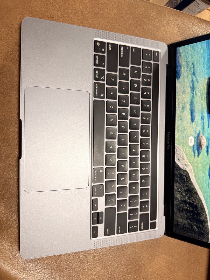 Apple MacBook Pro M1 2020 Space Grey (Category: Laptops & Notebooks) located in Pasig City. Submitted by declutter2023cleanout (Listing ID 1468335548, Image 3). Description: - Model: Apple MacBook Pro 13 in,Space Grey - 8GB RAM, 256 GB storage -83% battery Health, 468 cycle count - minimal scratches as shown in photos - barely used since I prefer iPad - touch bar is malfunctioning (if you touch it, it works but it does not show the icons) .