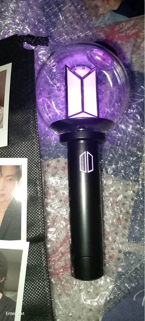 Armybomb ver.4 (Category: K-Wave Merchandise) located in Manila. Submitted by taehyung_kim1230 (Listing ID 1468283807, Image 2). Description: WTS: BTS Army Bomb Ver 4 bought from weverse 💜 - 100% Official and working - With Bluetooth, connects to BTS app - Includes: Lightstick + Pouch + 7 BTS Polaroids + Lightstick strap - Condition: 9/10 no major scratches - Willing to send any proofs that I bought it from weverse - RFS: Need funds - COD via LB