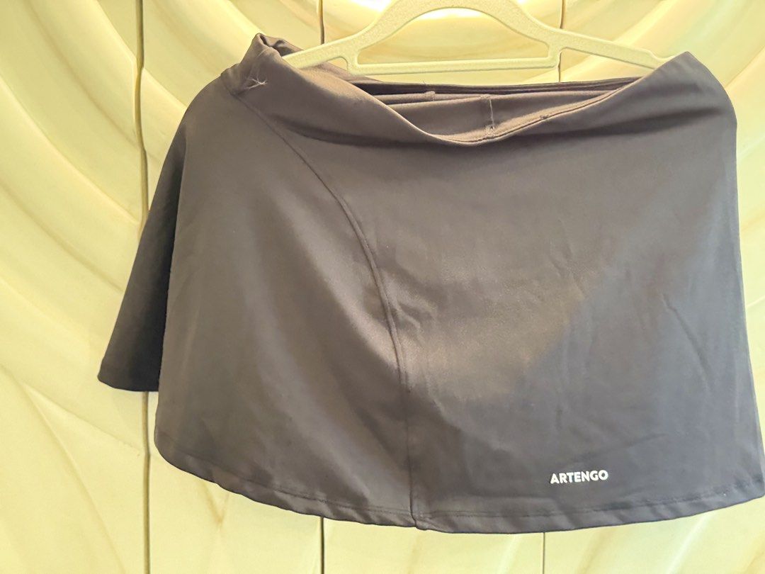 Artengo Tennis Skirts Bundle White Black (Category: Skirts) located in Angeles City. Submitted by adeclutters__ (Listing ID 1468343836, Image 2). Description: - Brand: Artengo - Bundle includes: 2 sports skirts (1 White, 1 Black) - Ideal for: Tennis, badminton, workouts, and everyday activewear - Features: Breathable fabric and a comfortable stretchy waistband - Condition: Clean, no tears or stains on either piece Bought at 895 each Selling at 80