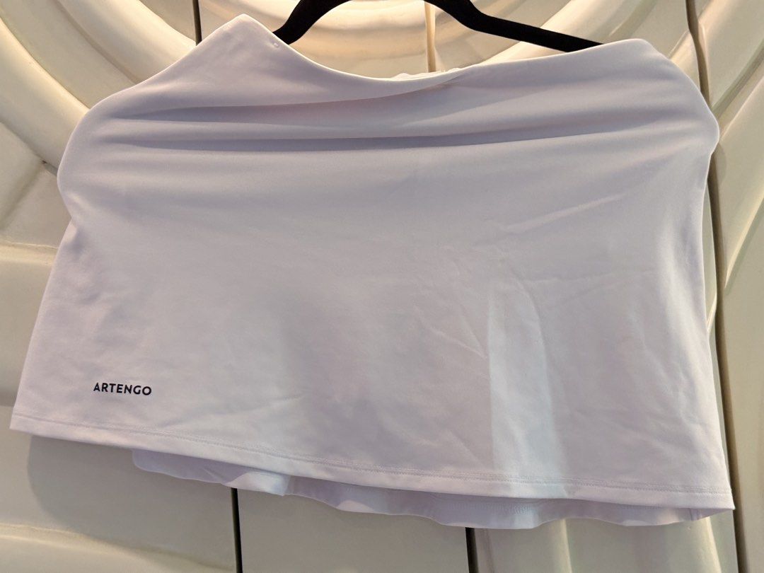 Artengo Tennis Skirts Bundle White Black (Category: Skirts) located in Angeles City. Submitted by adeclutters__ (Listing ID 1468343836, Image 3). Description: - Brand: Artengo - Bundle includes: 2 sports skirts (1 White, 1 Black) - Ideal for: Tennis, badminton, workouts, and everyday activewear - Features: Breathable fabric and a comfortable stretchy waistband - Condition: Clean, no tears or stains on either piece Bought at 895 each Selling at 80