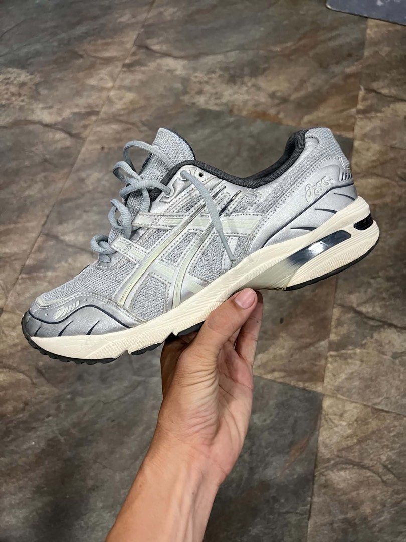 Asics Gel-1130 Silver Grey Sneakers (Category: Sneakers) located in Bacolod City. Submitted by novymaesel14868 (Listing ID 1468409664, Image 1). Description: - Model: Asics Gel-1130 - Color: Metallic Silver and Grey - Material: Classic mesh upper with synthetic overlays - Comfort: Cushioned sole with GEL technology in the heel - Details: Dark grey laces and inner lining - Condition: Great everyday rotation pair with minimal wear on treads.