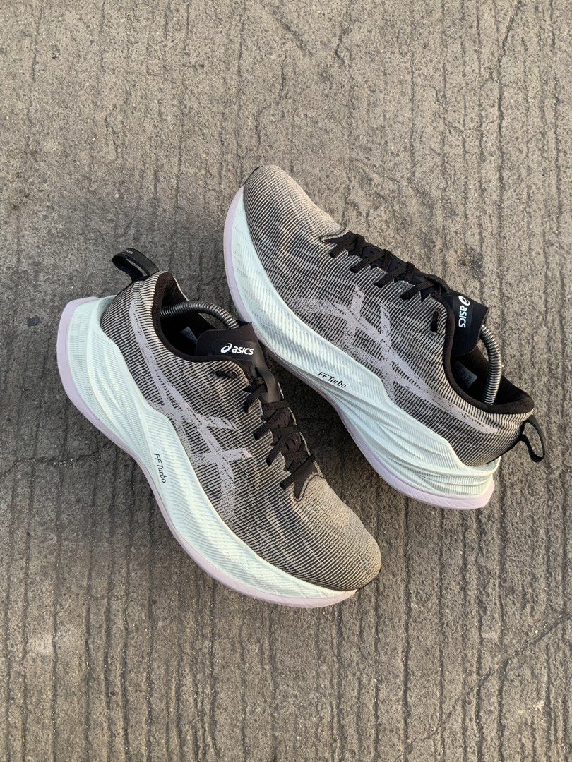 ASICS Superblast Running Shoes (Category: Sneakers) located in Cavite. Submitted by thriftkicks3 (Listing ID 1468368245, Image 2). Description: - Model: ASICS Superblast - Colorway: Grey and Black with black laces - Cushioning: High-performance FF Turbo midsole visible - Upper: Breathable mesh for maximum airflow - Extras: Includes shoe trees to keep shape intact - Ideal For: Long-distance runs and daily training miles - Condition: Carefully main