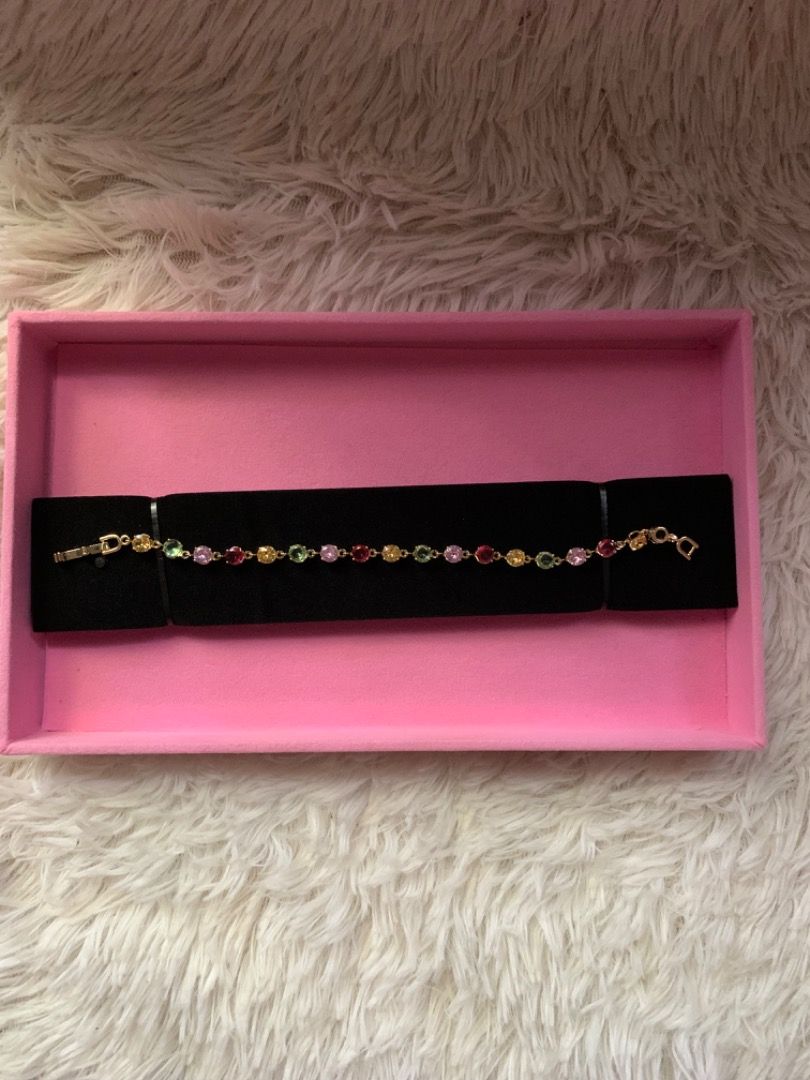 Assorted Aesthetic Fashion Bracelets (Category: Bracelets) located in Iloilo. Submitted by silenthawk.18becb (Listing ID 1468307893, Image 3). Description: - Collection of cute fashion bracelets in various designs and colors - Features floral vines, colorful crystals, pink tennis style, and sun motifs - Elegant gold-tone chains - Mix and match easily for different outfits - Great for daily wear or as a gift for loved ones.