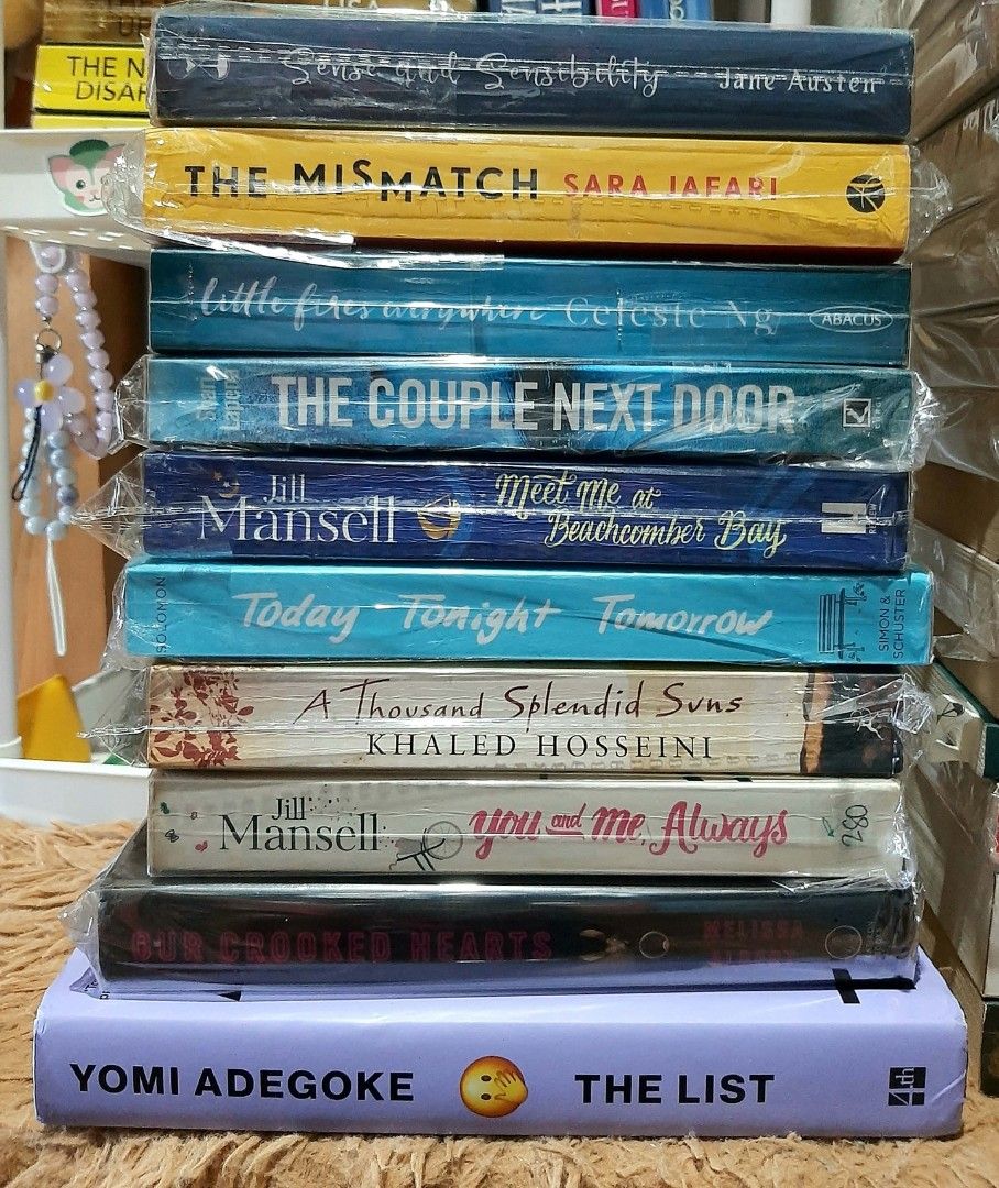 Assorted Fiction and Classic Novels Book Bundle (Category: Storybooks) located in Manila. Submitted by ayireads (Listing ID 1468395305, Image 1). Description: - Massive stack of fiction novels and classic literature - Authors include Charles Dickens, Dan Brown, Jodi Picoult, Jacqueline Wilson, Jane Austen, and Khaled Hosseini - Mostly paperback editions - Many books are still wrapped in plastic protection - Genres include thrillers, romance, cont