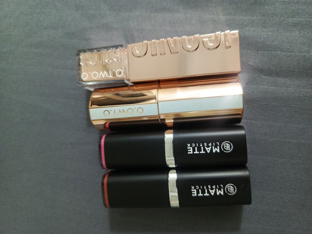 BUNDLE SALE: EVER BILENA O.TWO.O LIPSTICK (Category: Makeup) located in Manila. Submitted by raxxx17 (Listing ID 1468308896, Image 2). Description: - Set of 4 lipsticks in varied shades (nudes, pinks, and browns) - Includes: * O.TWO.O Hpaute Hydrating Satin Lipstick (Shade 02) * O.TWO.O Matte Lipstick (Shade M17) * Matte Lipstick in Off Beat Pink * Matte Lipstick in Siennas - Net Weight: 3.6g to 4g per lipstick - Features both satin and matte fin