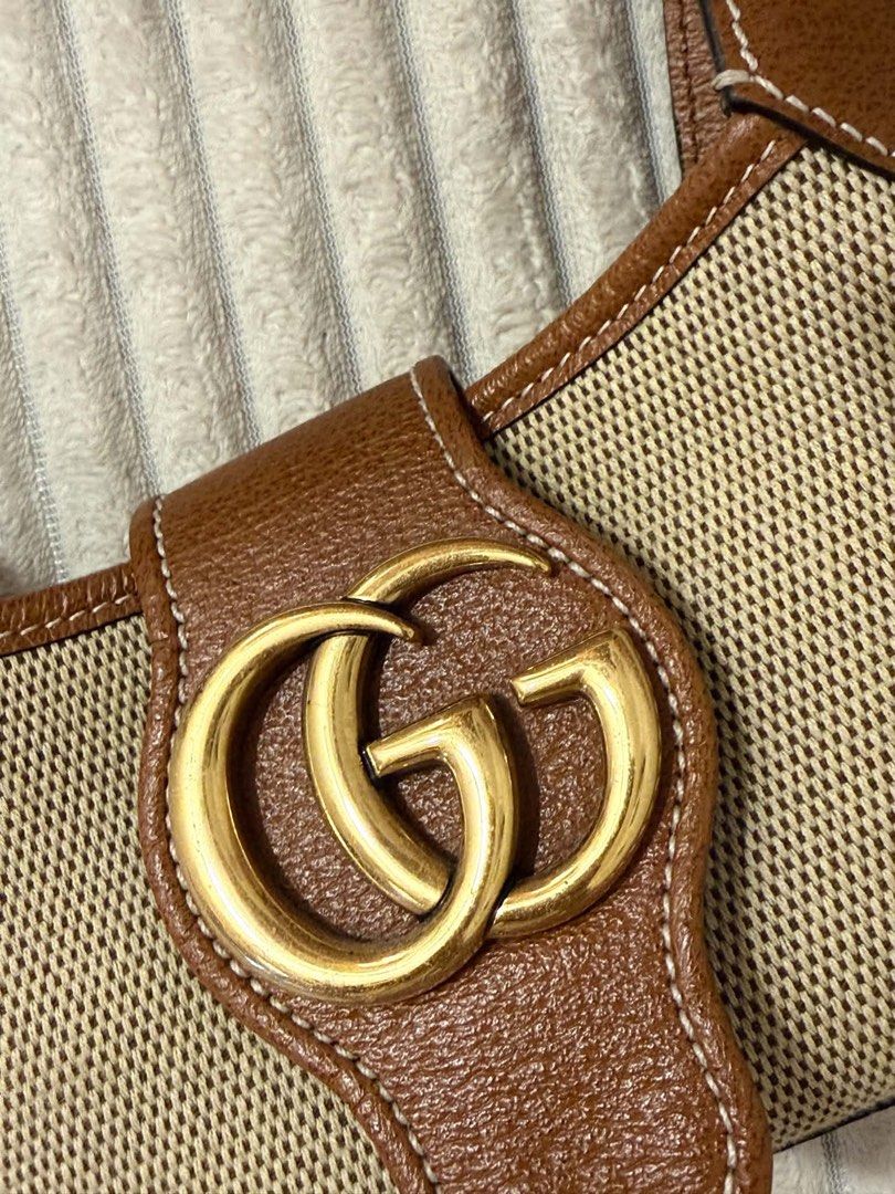 AUTH Gucci GG Aphrodite Canvas Shoulder Bag (Category: Luxury Bags & Wallets) located in Manila. Submitted by chee__llna (Listing ID 1468407045, Image 3). Description: GUCCI APHRODITE SMALL SHOULDER BAG 2023 Collection Excellent Preloved Condition • 2023 Release • Beige Canvas with Brown Leather Trimmings • Signature Gold GG Hardware • Minimal Signs of Use • Well Maintained • Comes with Original Gucci Box • Inclusions as Pictured • Actual Photos 