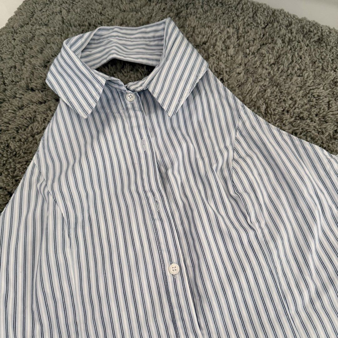 authentic bershka blue pinstripe backless halter top (Category: Sleeveless) located in Cebu City. Submitted by sayonarasells (Listing ID 1468313301, Image 2). Description: large on tag fits small better flaws: missing 2 buttons.