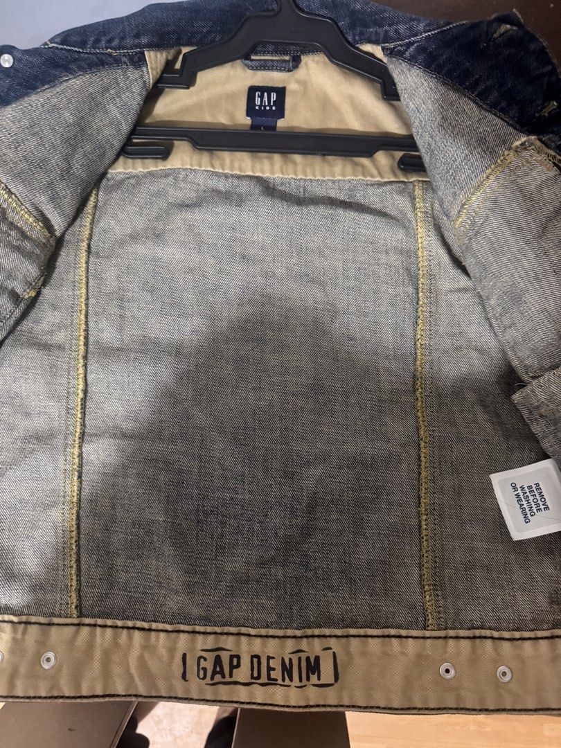 Authentic Gap Kids Denim Jacket (Category: Coats, Jackets and Outerwear) located in Cebu City. Submitted by altheatrix07243 (Listing ID 1468479597, Image 3). Description: Very Steal :) Gap Kids Denim Jacket Size 10 Large Fits a size XS adult Rfs: Decluttering, doesn’t fit anymore .