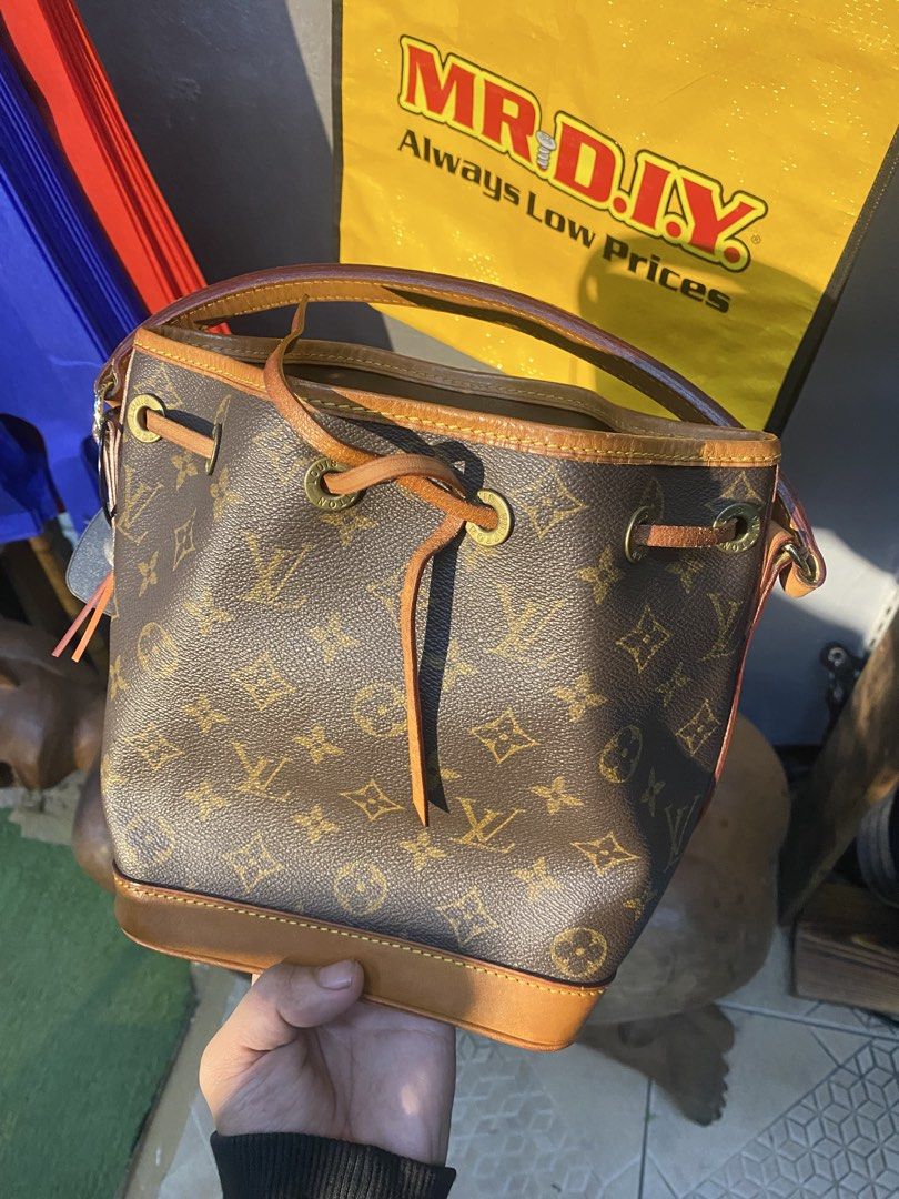 Authentic Louis Vuitton Monogram Noe Bucket Bag (Category: Luxury Bags & Wallets) located in Baguio. Submitted by elianaam. (Listing ID 1468314790, Image 1). Description: - Brand: Louis Vuitton - Style: Monogram Noe Bucket Bag - Material: Classic Monogram Canvas with Vachetta Leather Trim - Closure: Adjustable leather drawstring - Interior: Spacious single compartment - Hardware: Gold-tone metal eyelets - Authentication: Stamped Louis Vuitton Par