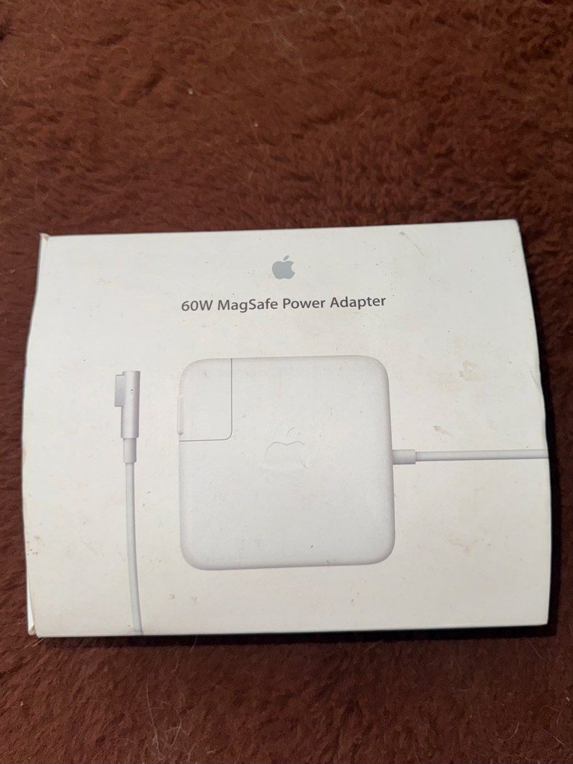 AUTHENTIC MACBOOK CHARGER (60W MAGSAFE POWER ADAPTOR) (Category: Chargers) located in Batangas. Submitted by bel_m24 (Listing ID 1468289931, Image 1). Description: PLS BUT AT YOUR OWN RISK. This charger has never been used since our MacBook Pro was already old and we weren't able to use it. COMPATIBLE: Compatible MacBook Pro Models (13-inch Non-Retina) - MacBook Pro (13-inch, Mid 2012) (Model A1278) - MacBook Pro (13-inch, Late 2011 / Early 2011)