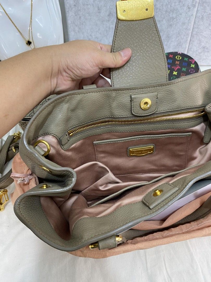 Authentic miumiu vitello caribu (Category: Luxury Bags & Wallets) located in Cebu City. Submitted by bisayaseller77 (Listing ID 1468447717, Image 2). Description: Authentic miumiu vitello caribu 2way bag w longstrap.