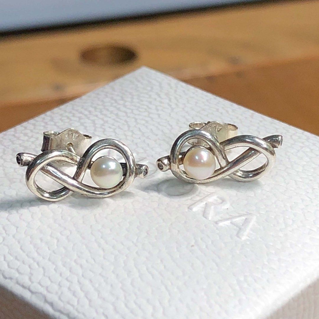 Authentic Pandora Infinity Knot Stud Earrings (Category: Earrings) located in Manila. Submitted by daintyjewels (Listing ID 1468324434, Image 1). Description: .