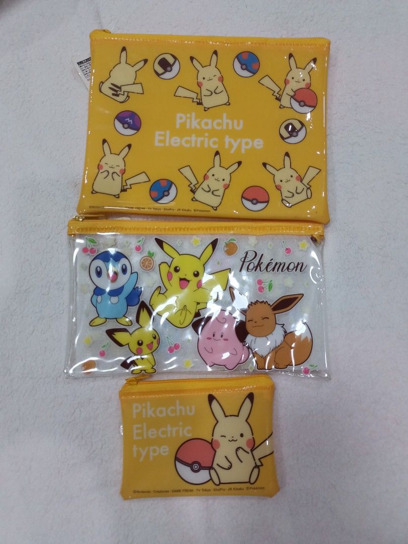 Authentic Pokemon Pikachu Flat Vinyl Zipper Pouch (Category: Character Goods) located in Manila. Submitted by jollynest24 (Listing ID 1468443004, Image 1). Description: - Authentic Pokemon and Friends Flat Vinyl Zipper Pouch - Electric-type designs with Pokéballs - Includes 1 clear pouch featuring Pikachu, Piplup, Eevee, Clefairy, and colorful fruits - Features secure and stylish gold zippers on top of each pouch - Versatile size, great for stori