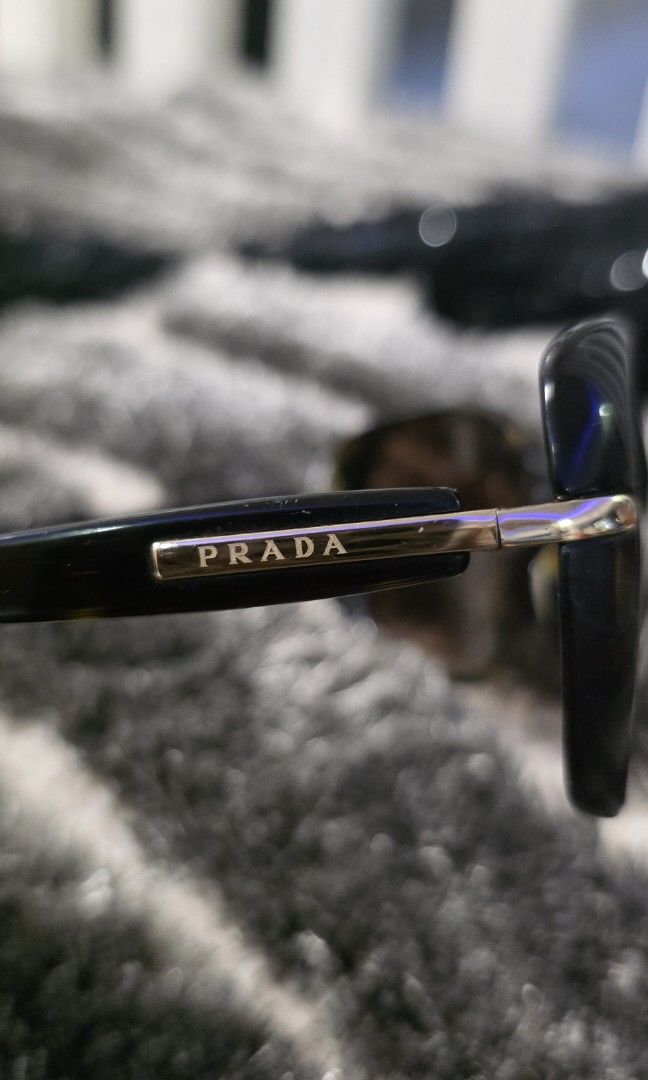 Authentic Prada PR 080S sunglasses (Category: Sunglasses & Eyewear) located in Apalit. Submitted by mjtwicedstyle_de_ap (Listing ID 1468342948, Image 3). Description: Preloved Authentic Prada PR 08OS Conceptual women's sunglasses in a Havana (tortoiseshell) frame with brown gradient lenses. small size no case still in good condition.