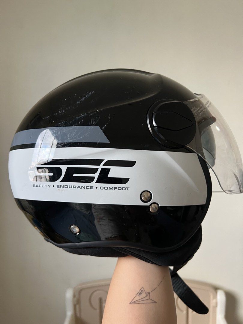 Authentic SEC Half Face Motorcycle Helmet (Category: Helmets and other Riding Gears) located in Pasig City. Submitted by goodjujuonlyyy (Listing ID 1468348869, Image 1). Description: Original SEC Half Face Helmet (Large) - Size L, fits head circumference 59-60 cm - ECE R 22.06 certified with safety stickers at the back - Clear scratch resistant visor attached - Free tinted visor - Free Helmet bag - Used for a month only (less than 5x) - 9/10 cond