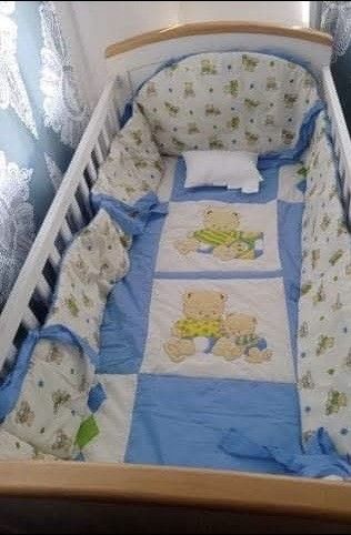 Baby Cot With Mattress and Bear Bedding Set (Category: Cots & Cribs) located in Las Pinas. Submitted by calmwolf_2a8740 (Listing ID 1468288486, Image 1). Description: - White wooden baby cot with a stylish natural wood top rail - Includes a comfortable mattress and adorable blue-and-white teddy bear bedding set (bumpers and pillows included) - Slatted sides for safety and optimal airflow - Sturdy metal wire mattress support base - Clean and well-