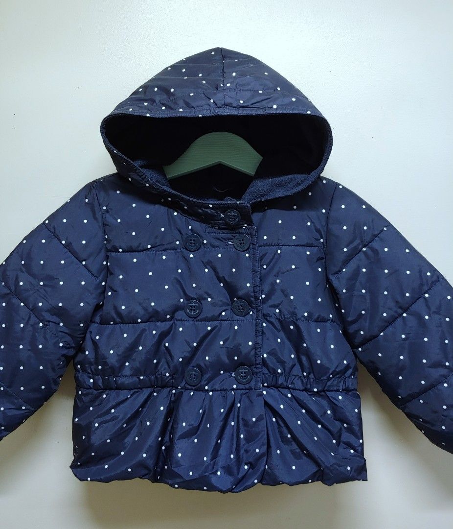 Baby Gap Puffer Jacket 18-24 Months (Category: Babies & Kids Fashion) located in Dagupan City. Submitted by upforgrabs2400 (Listing ID 1468430668, Image 2). Description: Baby Gap Puffer Jacket - Size: 18-24 months - Measurements: Shoulders 11" | Chest 14" | Length 14" - Color/Pattern: Navy blue with white polka dots - Features: Cozy attached hood, warm fleece lining, and double-breasted button closure.
