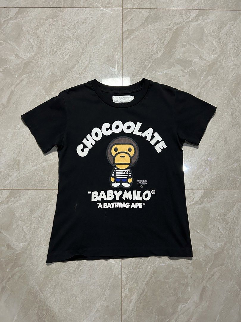 Baby Milo x Chocoolate Black Tee (Category: Shirts) located in Tayabas. Submitted by streetdepartment (Listing ID 1468415320, Image 2). Description: Baby Milo x Chocoolate Black Tee Good condition Color rate 8/10 Issue: washable stain and holr Size: Small fits XS Womens Measurements (inches): Width: 16” Length: 21.5” Dm to purchase! Note: Manage your expectations as you are dealing with secondhand items. Color may vary due to lighting. No return 