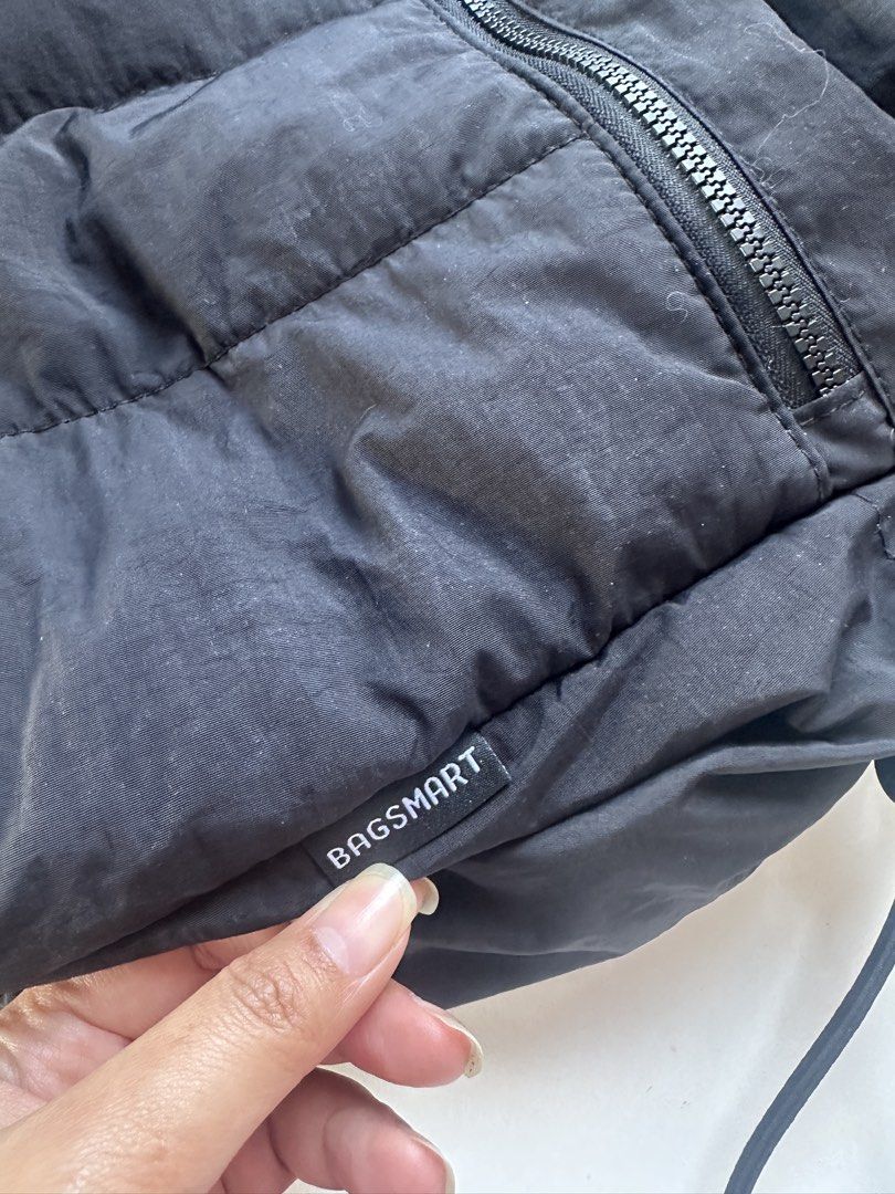 BAGSMART Black duffle bag PLUS (Category: Tote Bags) located in Paranaque City. Submitted by kimdmd (Listing ID 1468325898, Image 2). Description: - Brand: BAGSMART - Color: Classic black with grey interior lining - Material: Trendy quilted puffer design - Storage: Spacious main compartment with top zip closure - Extra Pockets: Front zipped pocket and interior slip pockets - Laptop Compartment: Dedicated padded sleeve with elastic security strap 