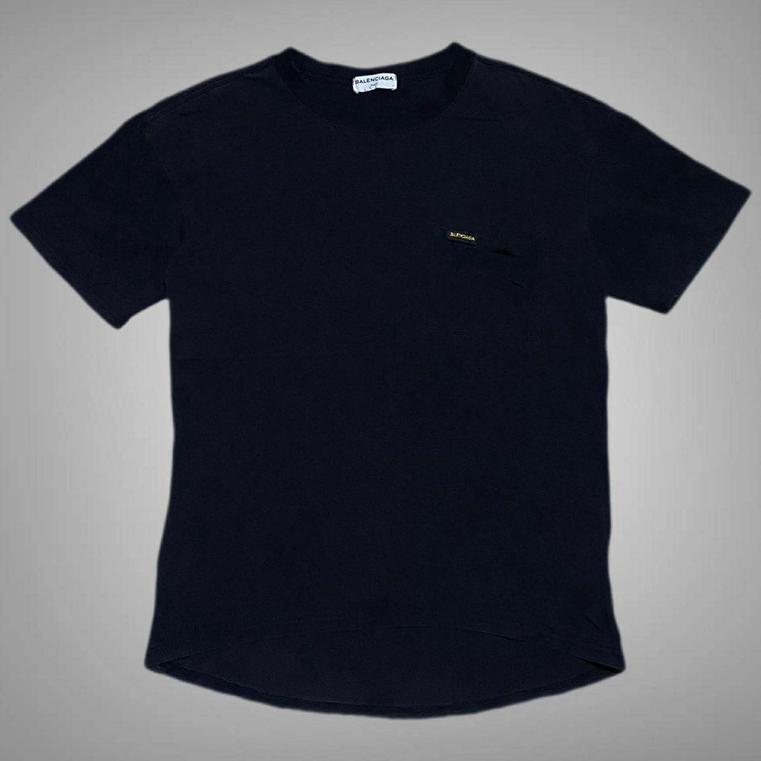 Balenciaga Pocket Tee (Category: Shirts) located in Mabalacat. Submitted by stellargarments (Listing ID 1468329960, Image 1). Description: Length : FRONT - 24 | 28 - BACK Width : 20 Condition : 9/10 PATCH GOLD LOGO COMPLETE TAGS SUPER NICE & KINIS! VERY COMFY & SMOOTH ON SKIN SAKTO LANG TELA NEED WASH NO MAJOR STAIN FRESH FROM BALE.