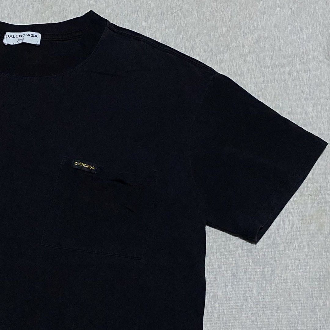 Balenciaga Pocket Tee (Category: Shirts) located in Mabalacat. Submitted by stellargarments (Listing ID 1468329960, Image 3). Description: Length : FRONT - 24 | 28 - BACK Width : 20 Condition : 9/10 PATCH GOLD LOGO COMPLETE TAGS SUPER NICE & KINIS! VERY COMFY & SMOOTH ON SKIN SAKTO LANG TELA NEED WASH NO MAJOR STAIN FRESH FROM BALE.