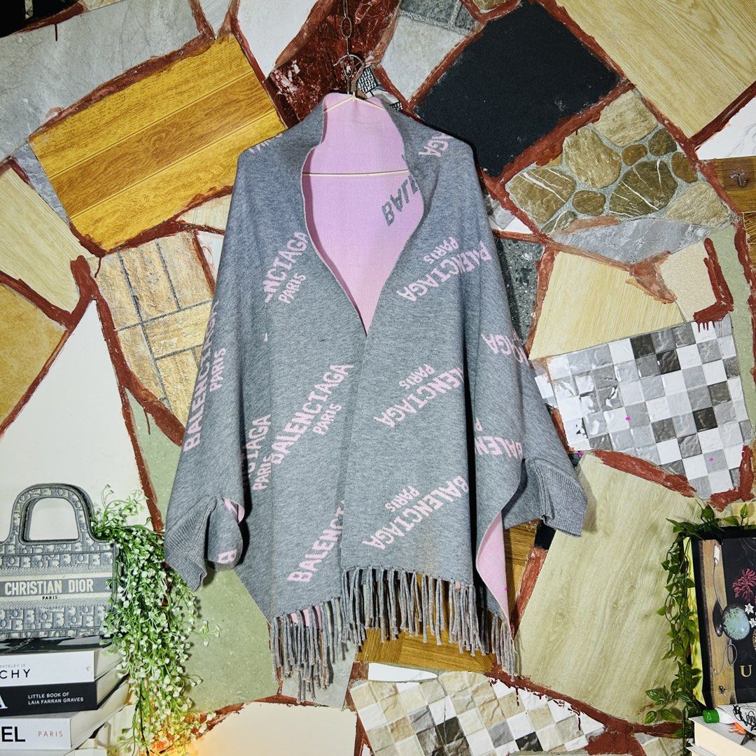 Balenciaga poncho with sleeves (Category: Luxury Apparel) located in Baguio. Submitted by kckc_luxury (Listing ID 1468407069, Image 1). Description: Free size Excellent .