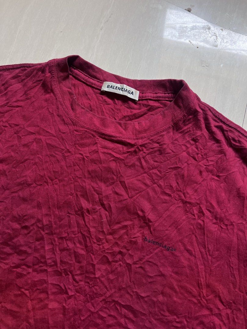 Balenciaga Red T-Shirt Medium (Category: Shirts) located in Zamboanga. Submitted by safe.haimer (Listing ID 1468446564, Image 2). Description: - Brand: Balenciaga - dimes L28 W23 - Size: Medium (tag at collar) - Material: Cotton (Made in Portugal) - Design: Crew neck with small black logo embroidery on the chest - Condition: Good, with normal signs of wear - Details: Interior care label intact.