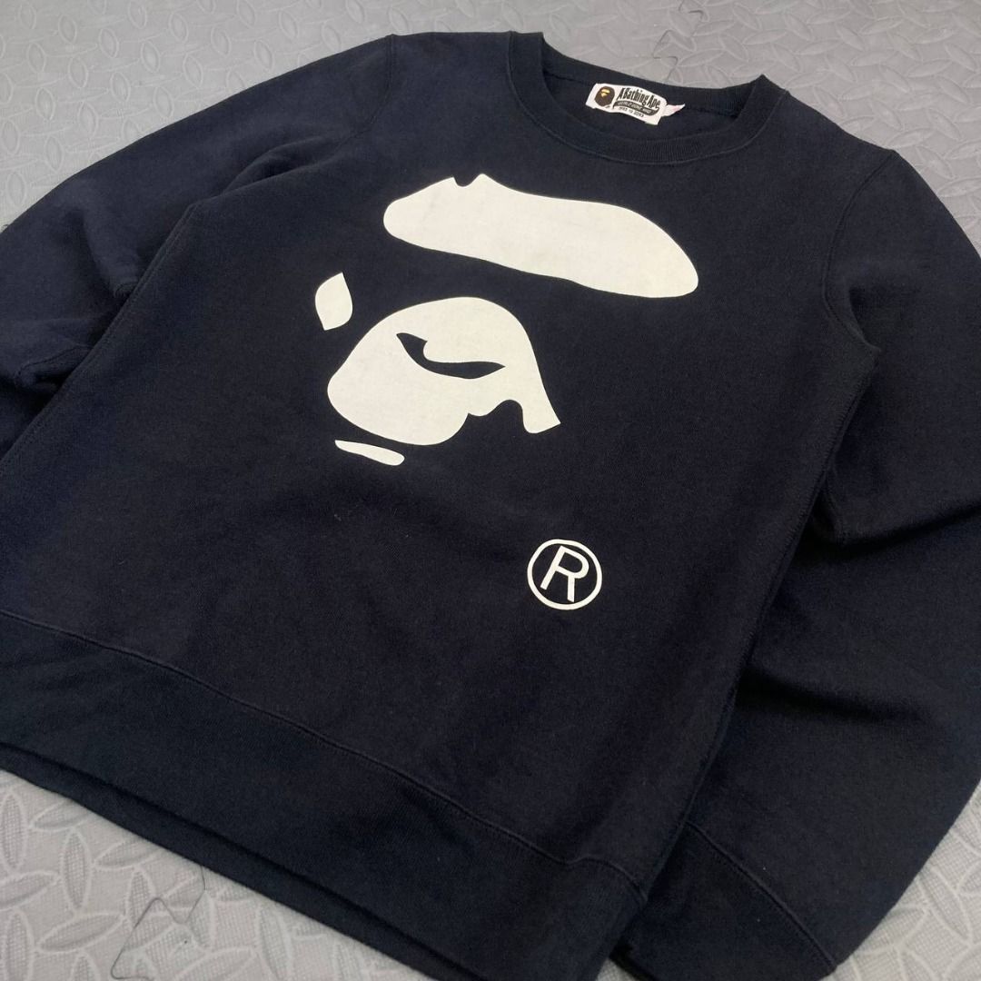 Bape - Ape Face Graphic Pullover Sweatshirt (Category: Others Tops) located in Quezon City. Submitted by archived.g (Listing ID 1468311150, Image 3). Description: Bape - Ape Face Graphic Pullover Sweatshirt - Brand: Bape Made in: China Year: Material: Cotton Color: Black Size on tag: XS Sizing: Measurements (flat, not stretched): Shoulders: 15” Sleeves: 24.5” Width: 17.5” Hem: 16” Length: 23.7” Color rating: 9.5/10 Condition overall: 9.5/10 Issue