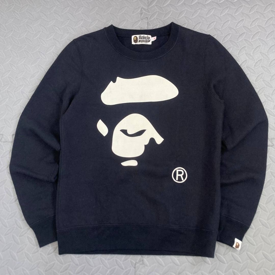 Bape - Ape Face Graphic Pullover Sweatshirt (Category: Others Tops) located in Quezon City. Submitted by archived.g (Listing ID 1468311150, Image 1). Description: Bape - Ape Face Graphic Pullover Sweatshirt - Brand: Bape Made in: China Year: Material: Cotton Color: Black Size on tag: XS Sizing: Measurements (flat, not stretched): Shoulders: 15” Sleeves: 24.5” Width: 17.5” Hem: 16” Length: 23.7” Color rating: 9.5/10 Condition overall: 9.5/10 Issue