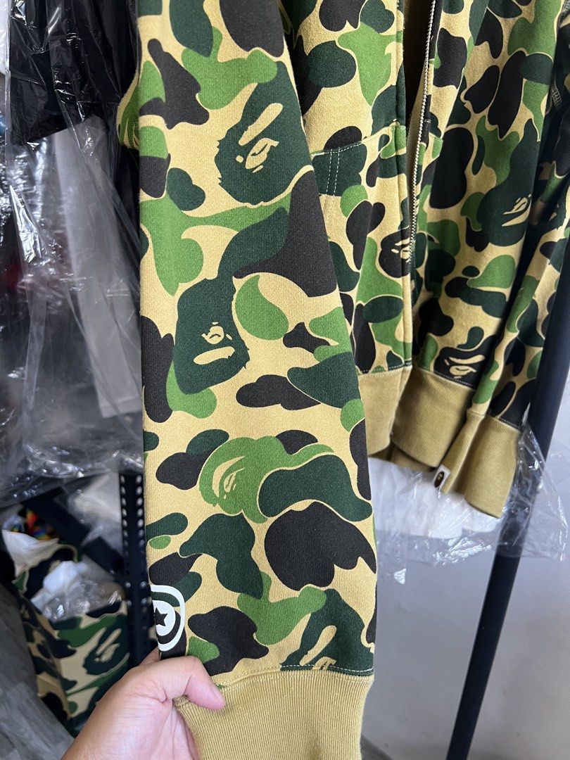 Bape camp full zip hoodie (Category: Hoodies) located in Cavite. Submitted by ziicollections (Listing ID 1468302747, Image 2). Description: Selling My personal hoodie Abc camo green full zip hoodie Womens sizing on tag MEDIUM: 22 width x 25 length Japan released No issue or flaws.