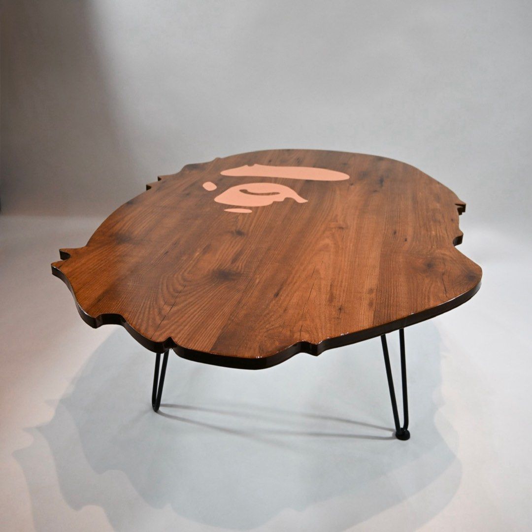 BAPE Inspired Wooden Coffee Table (Category: Tables & Sets) located in Caloocan City. Submitted by kustom.manila (Listing ID 1468412149, Image 2). Description: Featuring a distinctive coffee table from KusTom Unique Objects, Not for All. Featuring an BAPE logo inspired silhouette a warm wood grain finish and sleek black metal legs. MAKE IT YOURS! Interested in this design or looking for a customized piece? Message KusTom to inquire about availabl